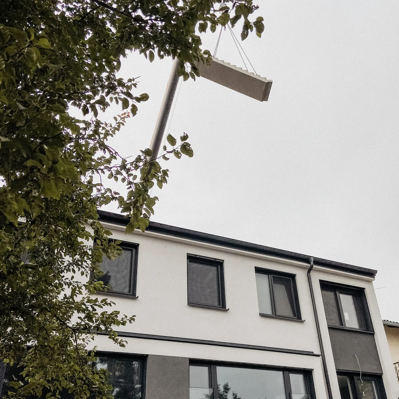 Sanierte Fassade eines Wohnhauses – Bestandsplanung und Sanierung mit aim architektur